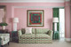 Kit Kemp Firmdale Hotel Suite Lost and Found upholstered Sofa and pink striped walls.